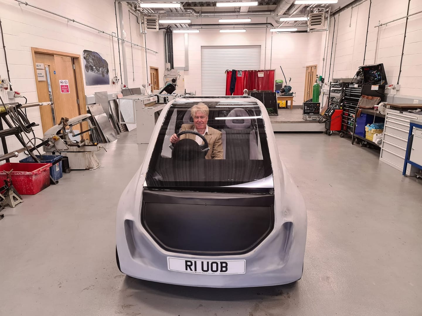Tim Harper in a low cost EV